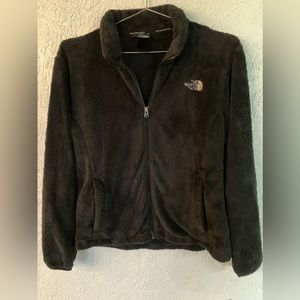 Black North Face girls size large extra fuzzy fleece jacket.